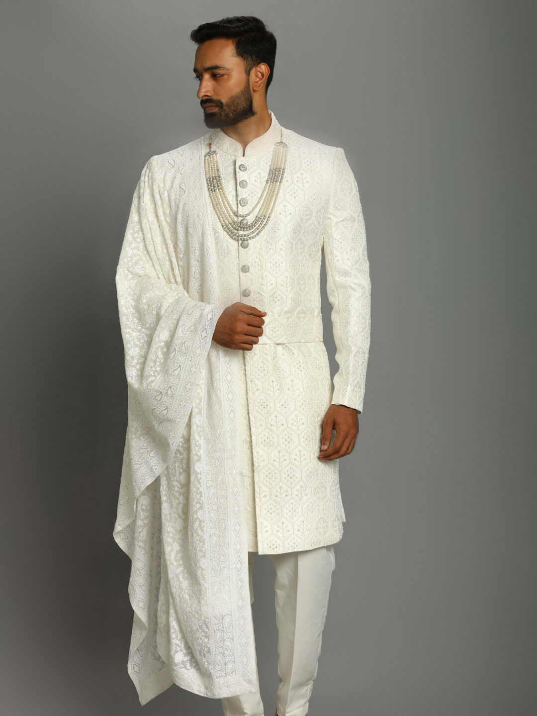 displaying image of White Shiny Pure Heavy Groom Sherwani
